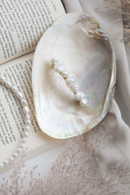 Load image into Gallery viewer, Modern Lux Hair Jewelry GIONNY Baroque Pearl Barrette in 14k gold plated metal placed on seashell