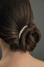 Load image into Gallery viewer, Model wearing Modern Lux Hair Jewelry GALIA fresh water pearl hair comb on her bridal French chignon hair updo
